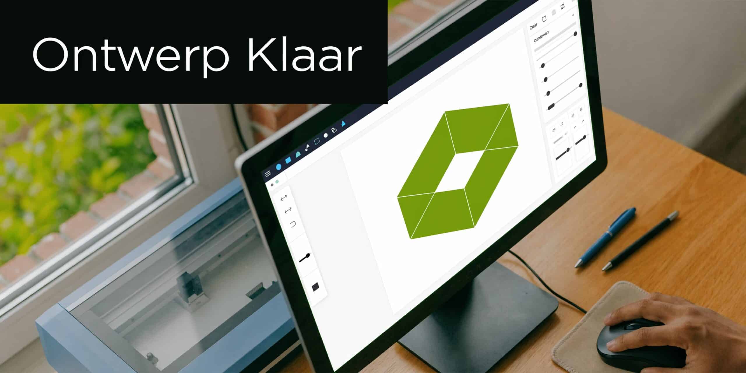 Een grafisch ontwerper werkt op een computer aan een groen geometrisch logo voor textielbedrukking.